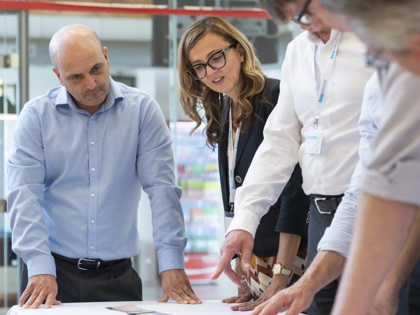 Knauf Employees looking at documents