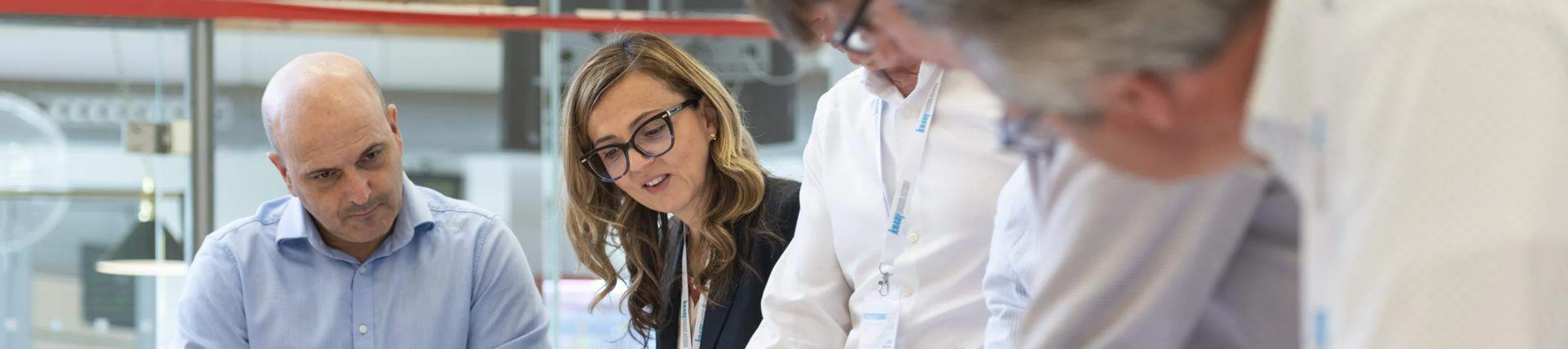 Knauf Employees looking at documents
