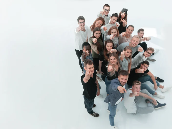 top view. group of happy young people looking at the camera