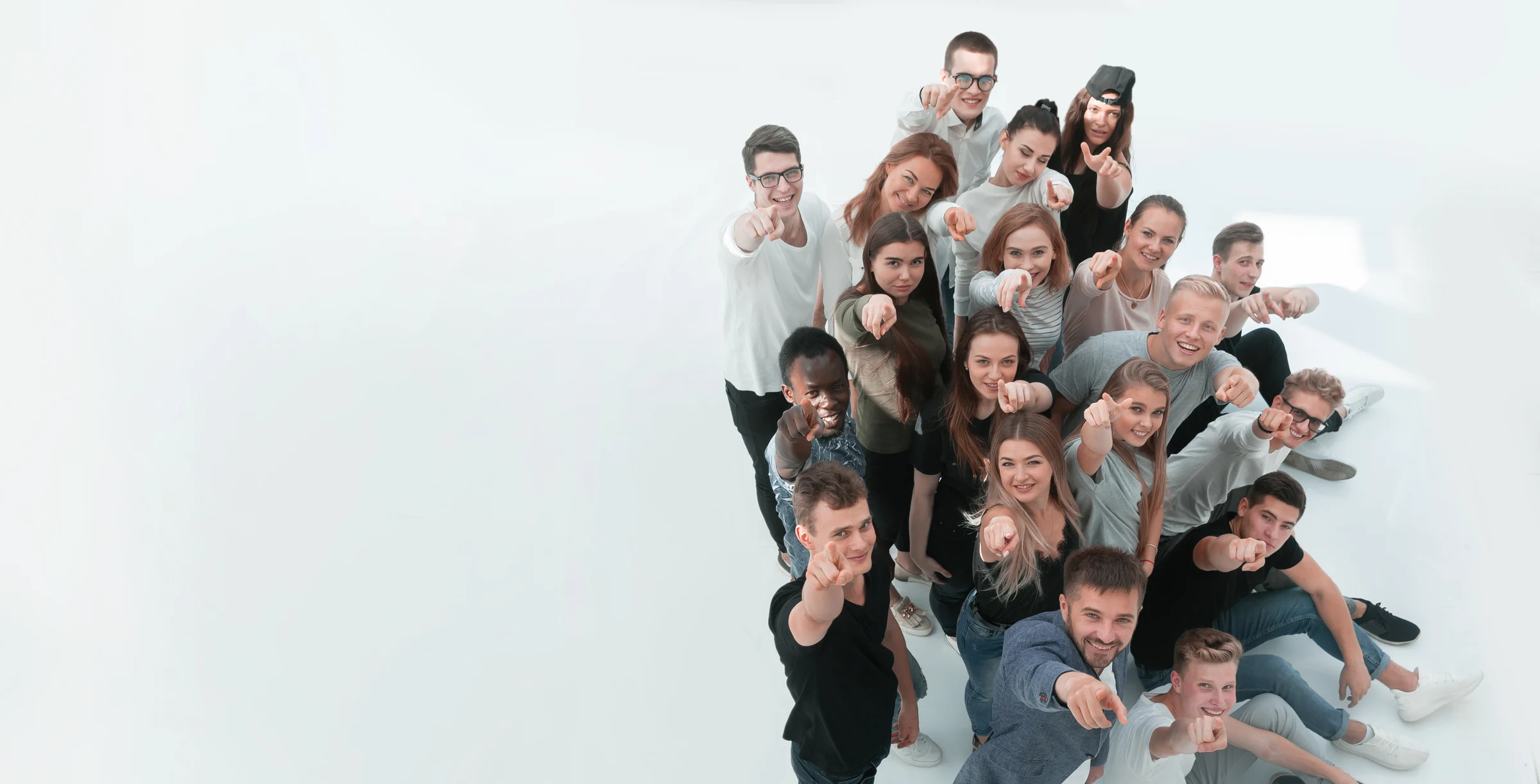 top view. group of happy young people looking at the camera
