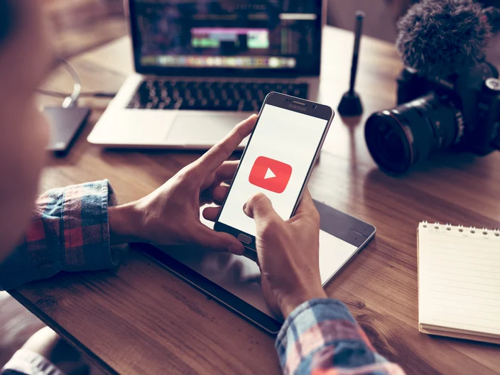 Creative or producer planning about his upload video to youtube