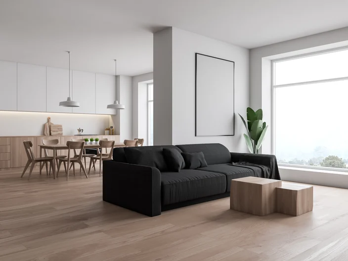 White living room and kitchen corner