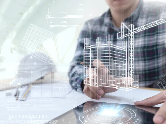 Engineer or Architect looking and touching interface with building design reality virtual technology on computer tablet at modern office on site . Building automation digital wireless control concept