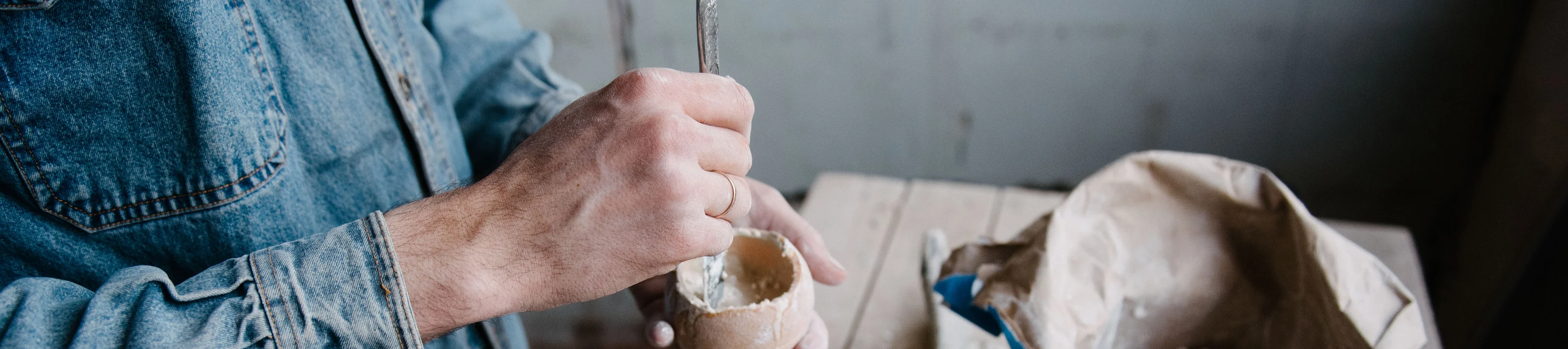 Manually mixing gypsum and water