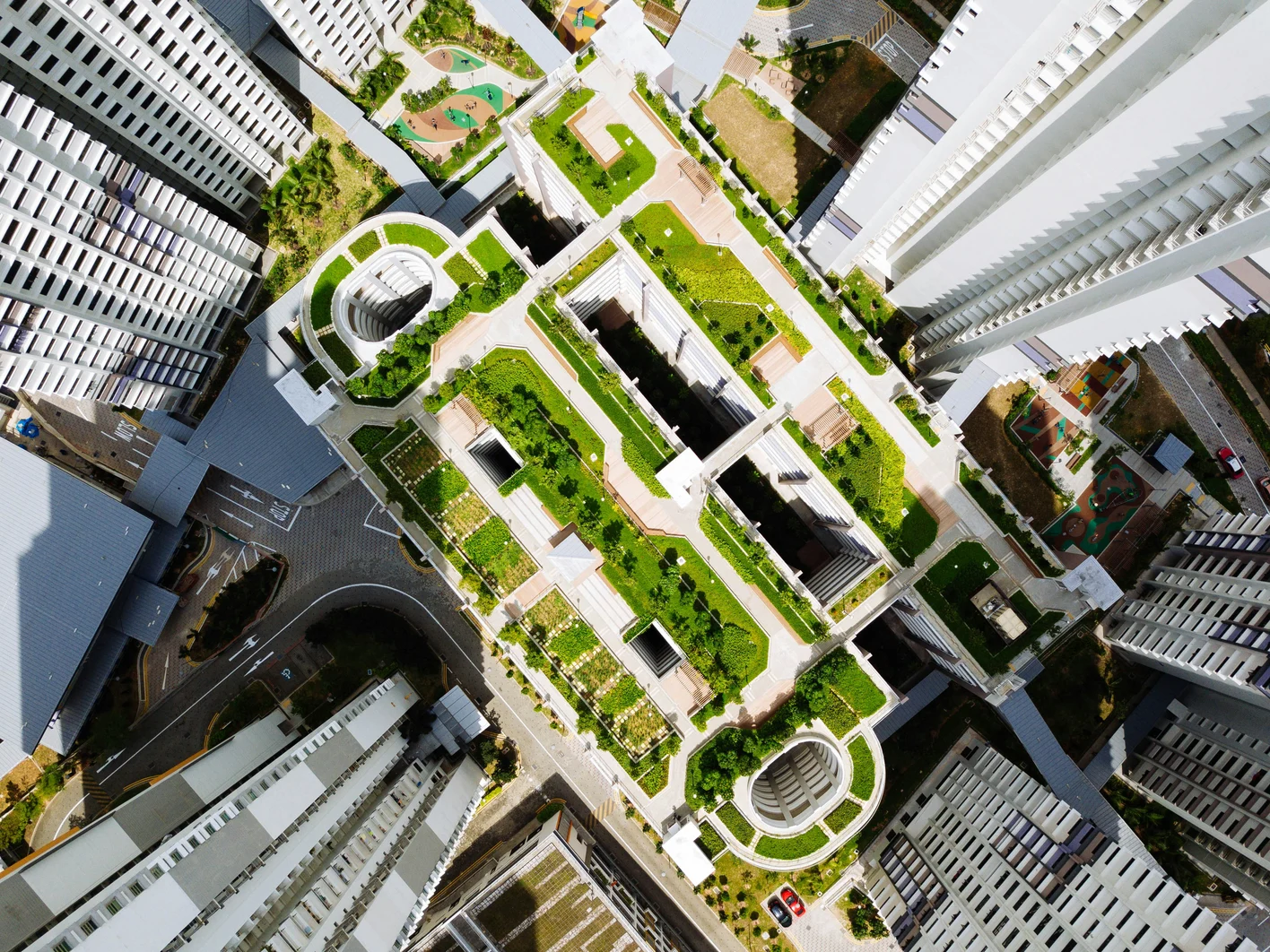 Aerial view of building with greenery on roof
