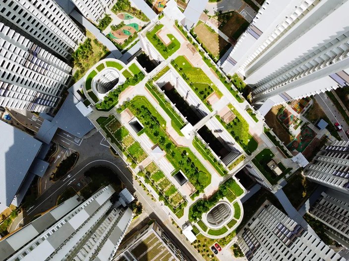 Aerial view of building with greenery on roof