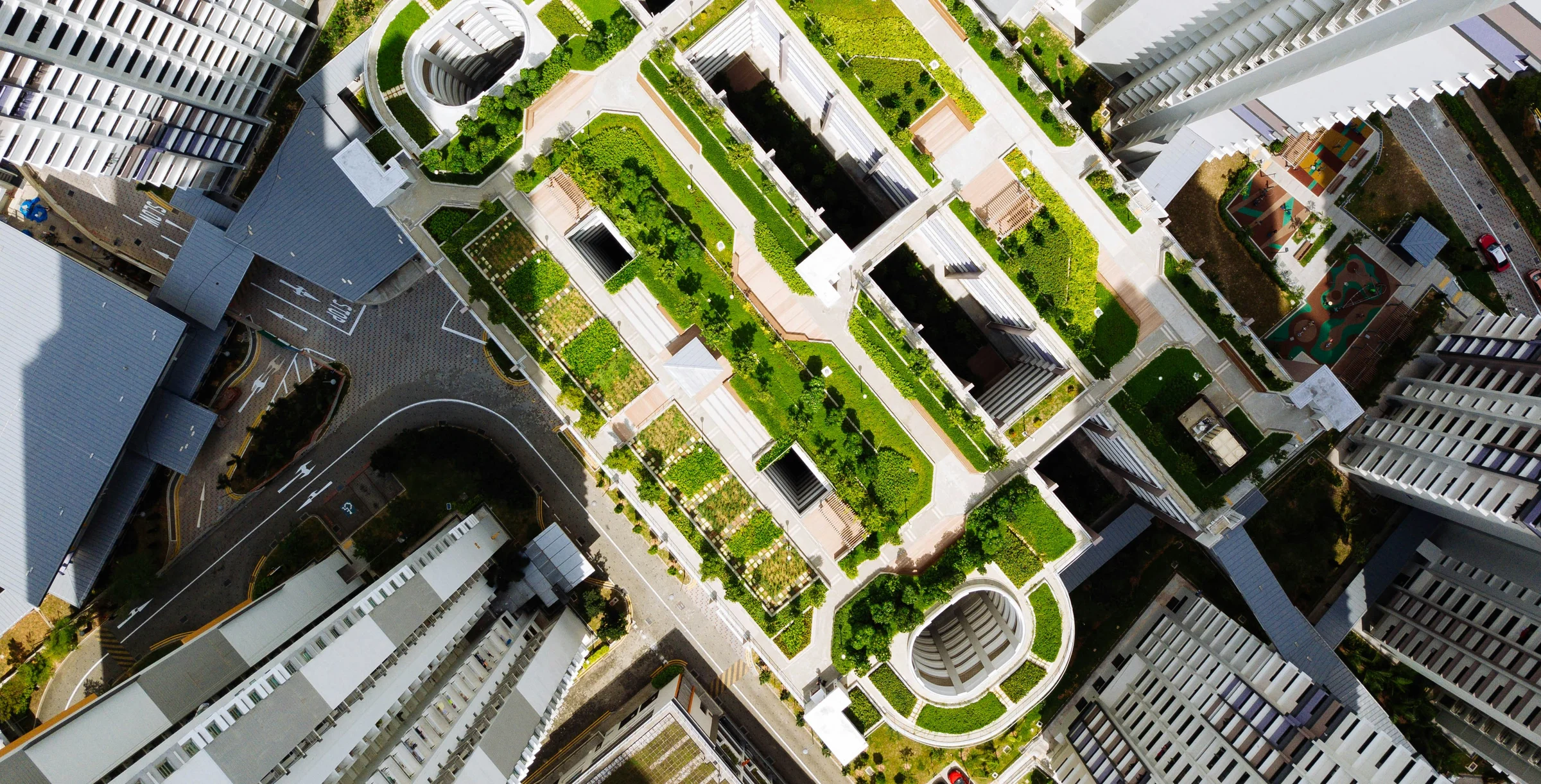 Aerial view of building with greenery on roof
