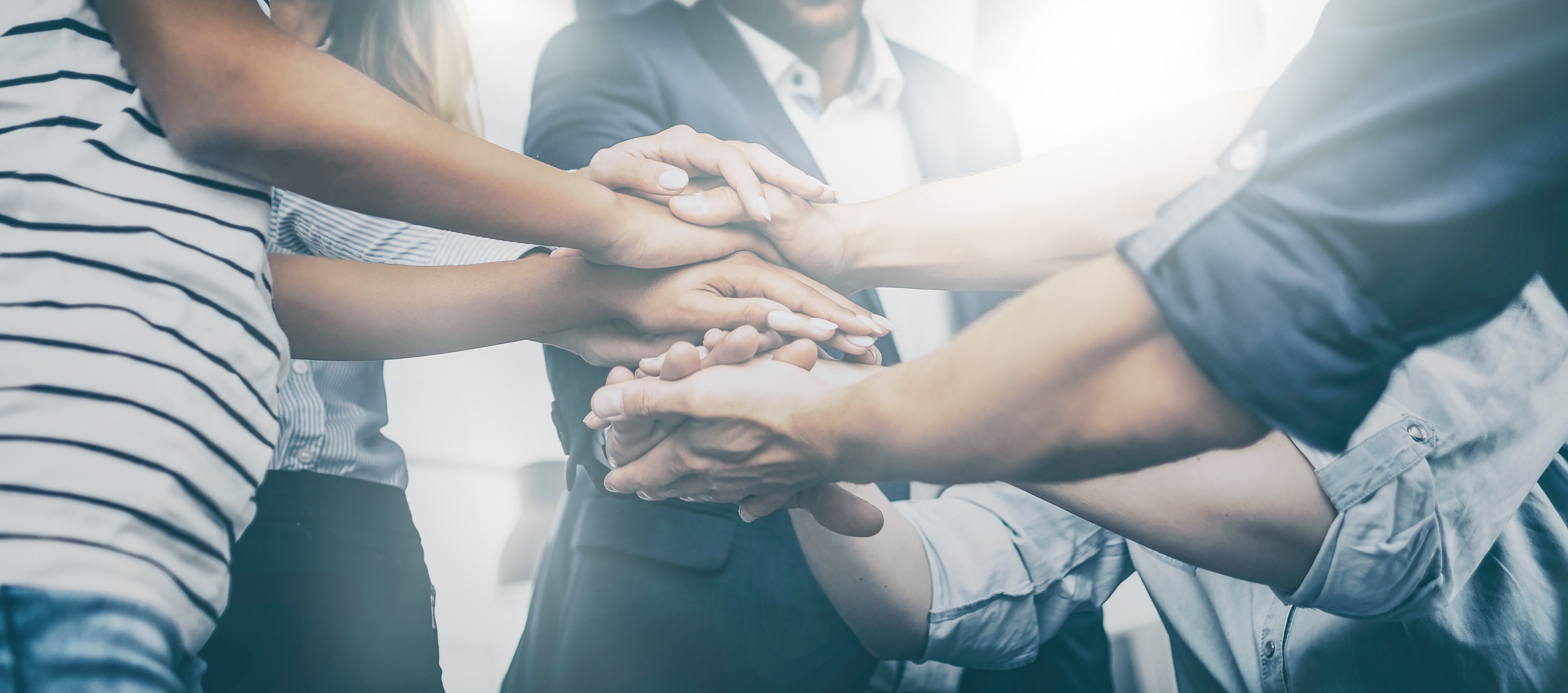 Unity and teamwork stack of hands