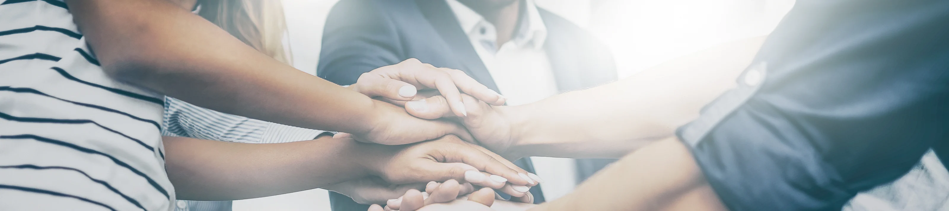Unity and teamwork stack of hands