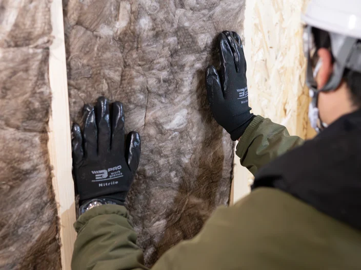 Wall insulation installation photo