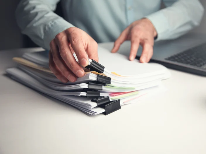 man hand document report paper and computer