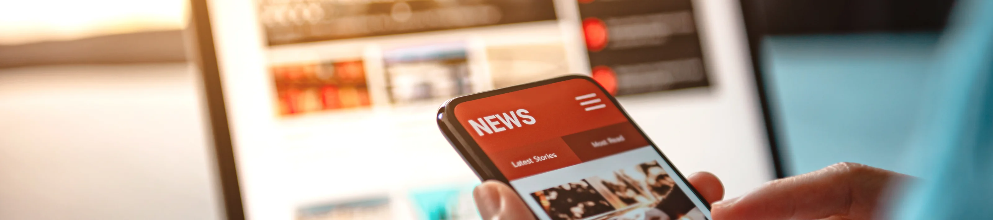 Online news on a smartphone. Mockup website. Woman reading news or articles in a mobile phone screen application at home. Newspaper and portal on internet.