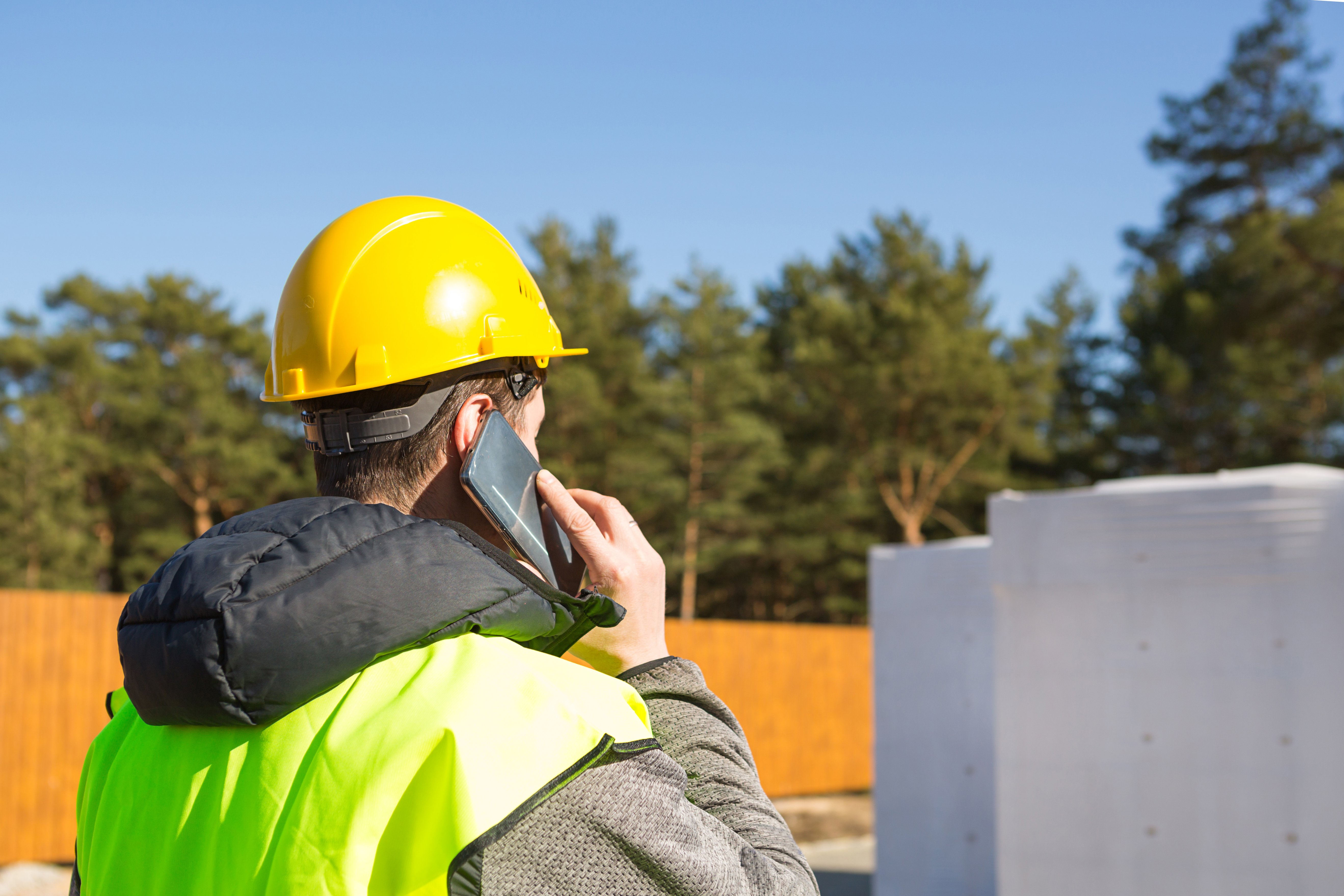 Builder Talking On Phone