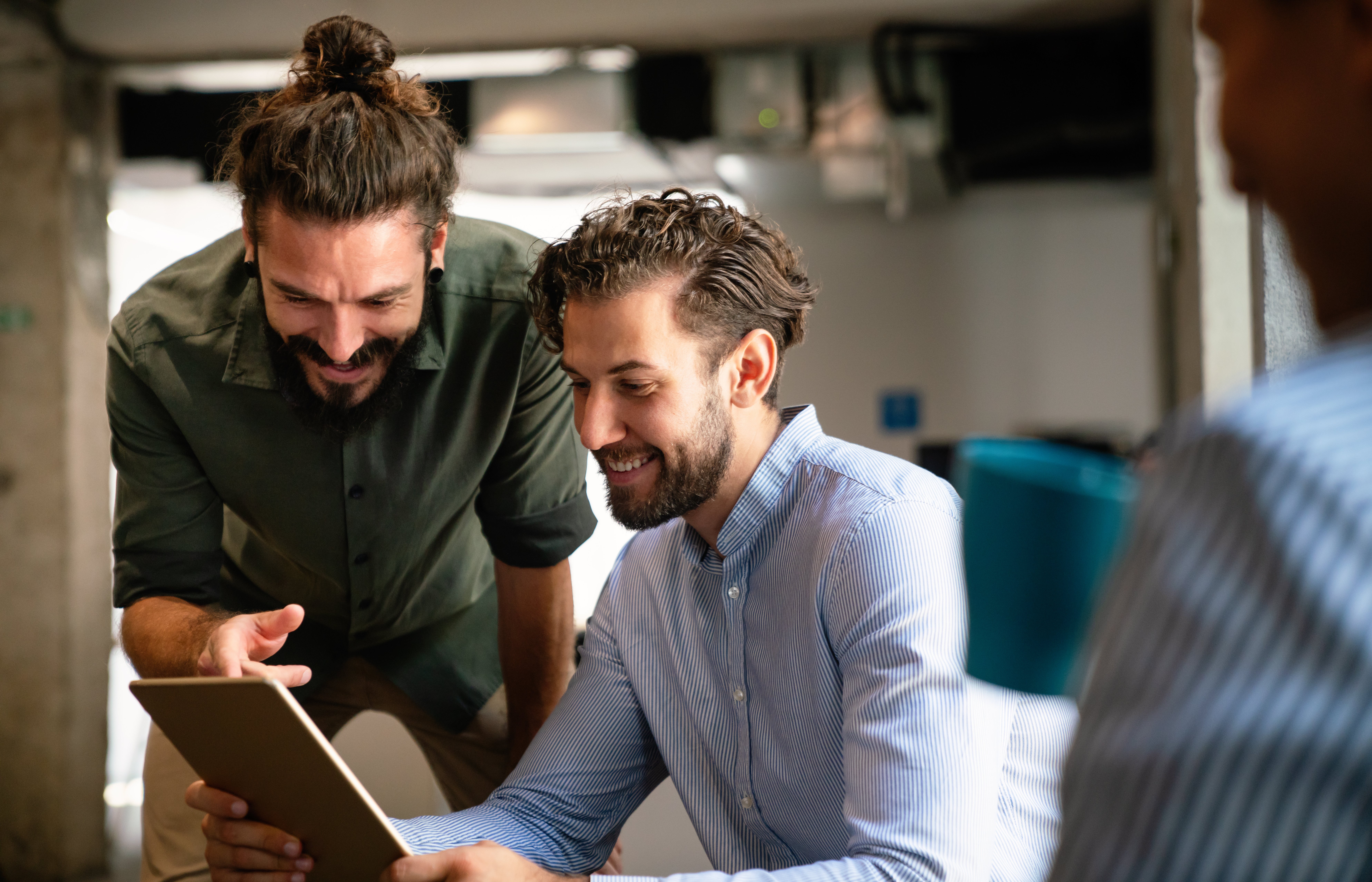 Multiethnic group of happy business people working together in office