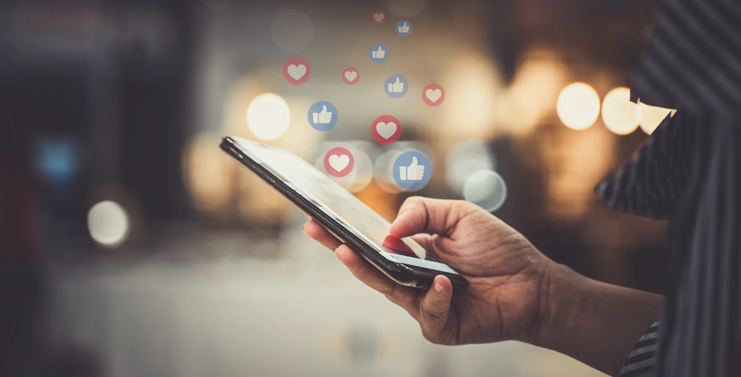 Hand using smartphone with Social media concept.