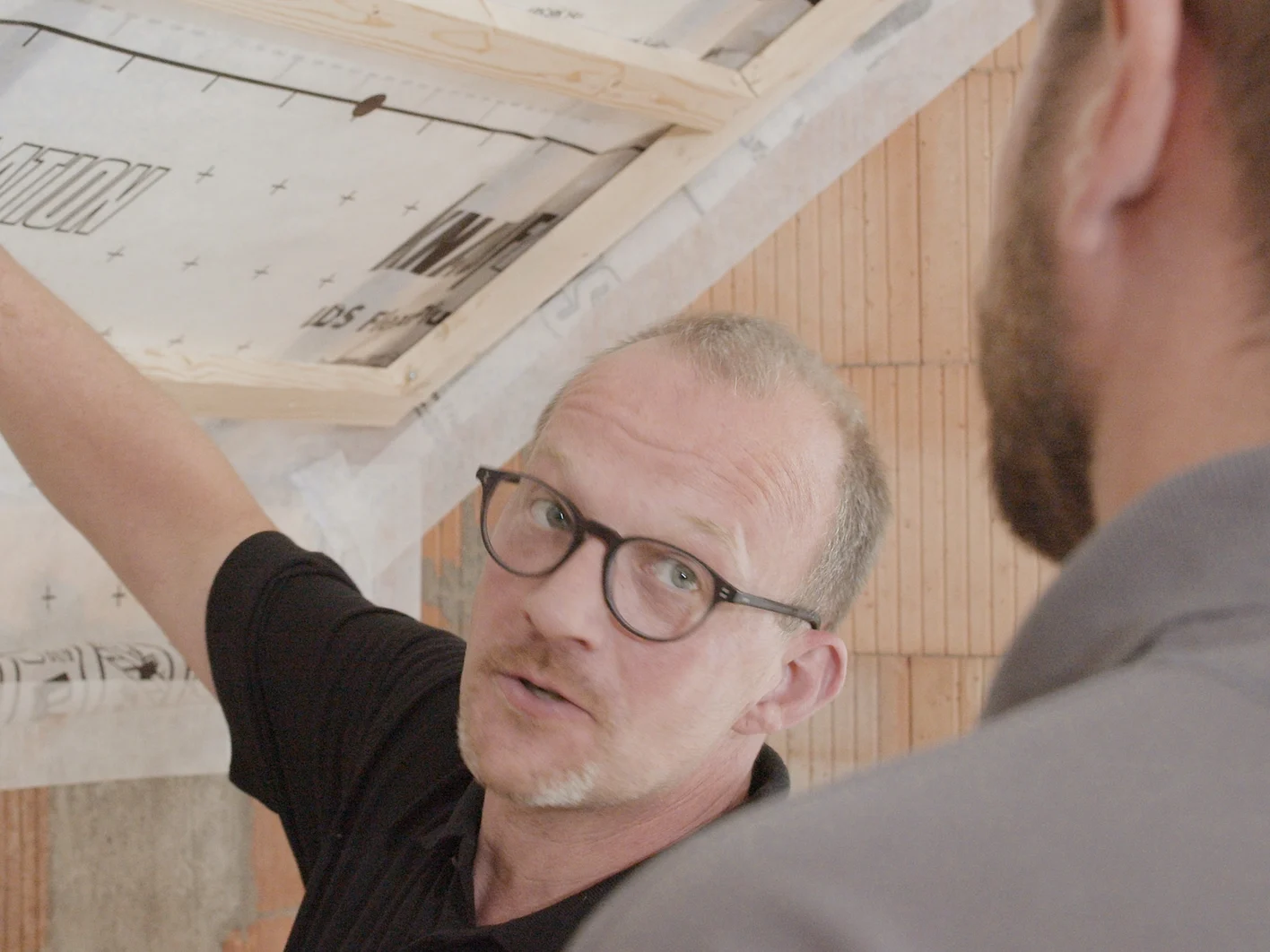 Installers working with Supafil closeup