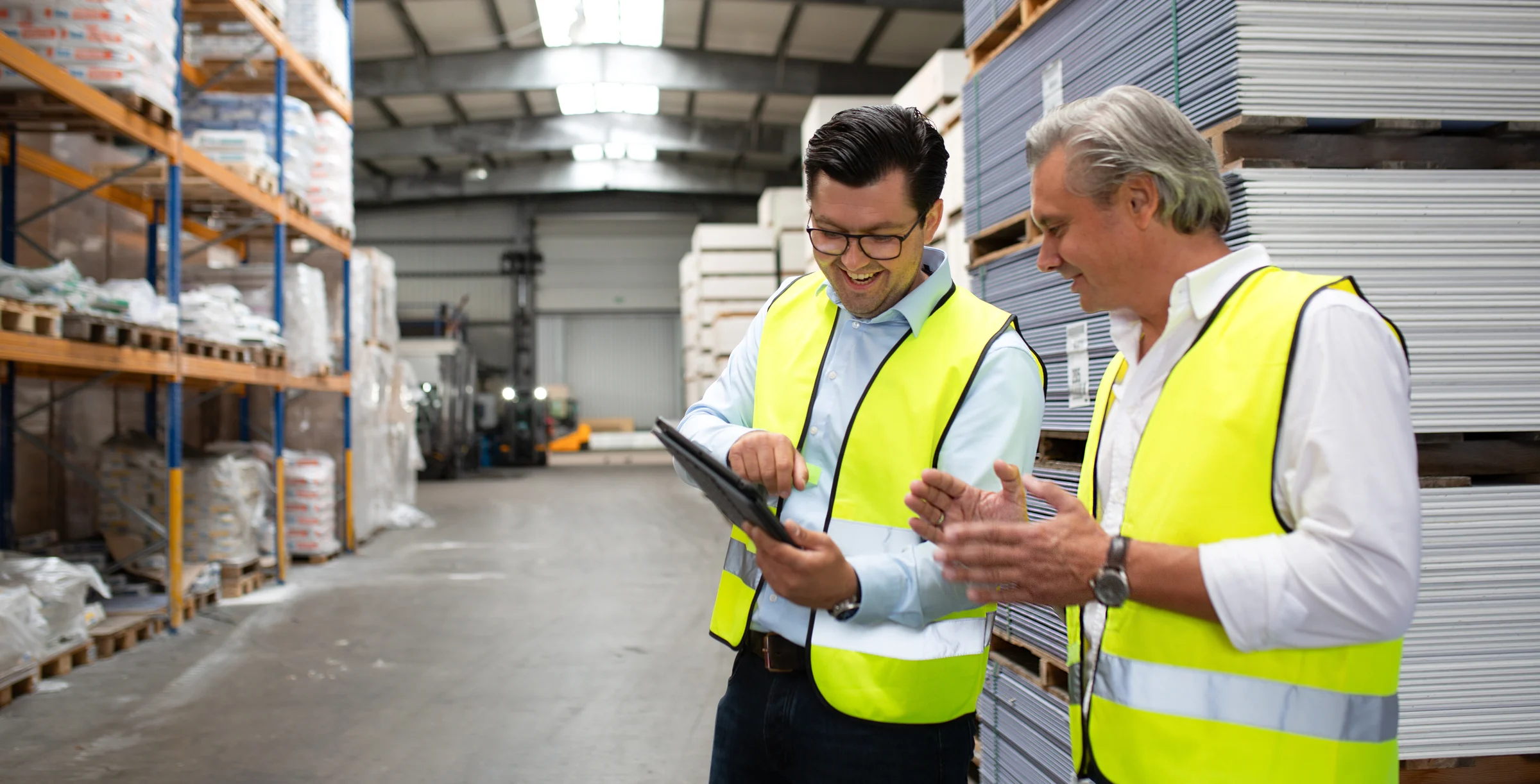 Customer and employee in warehouse