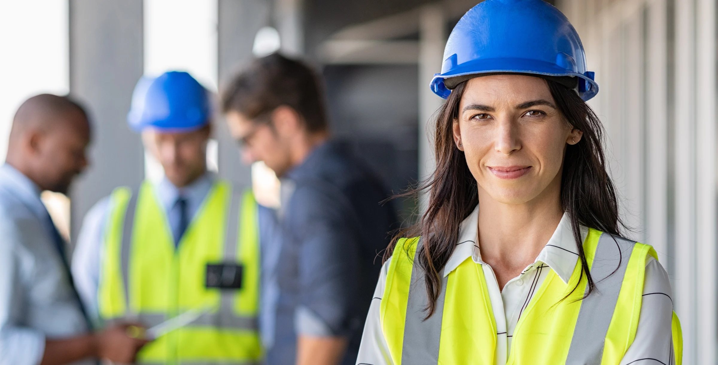 Confident architect at construction site