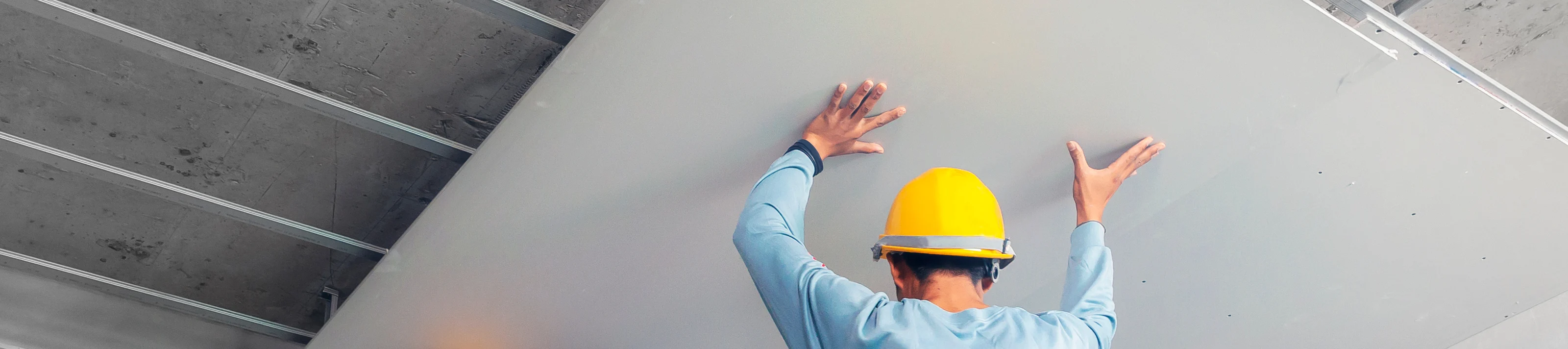 Ceiling installation with acoustic panels With professional tech