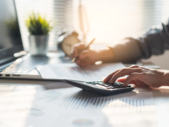 Tax deduction planning concept. Businessman calculating business balance prepare tax reduction.