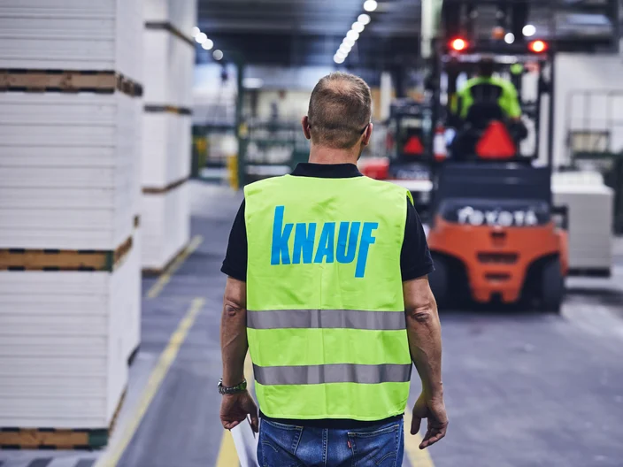 UK-GYP-Employee walking in factory