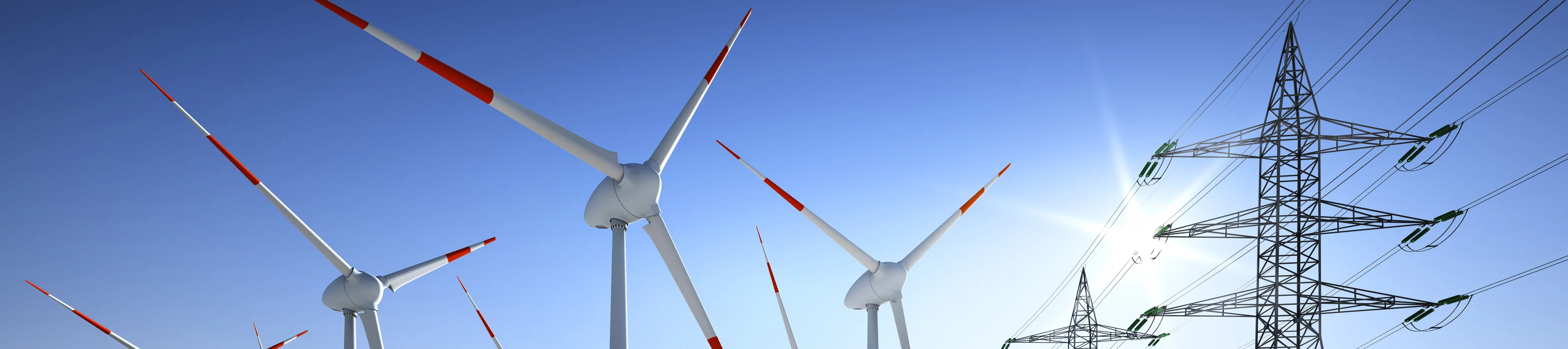 Konzept - Energiequelle Wind und Solar mit Stromleitungen