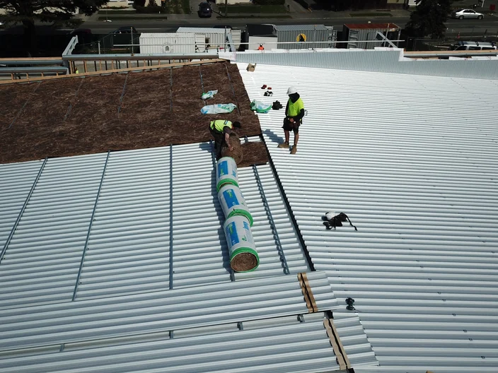 Metal-Roofing-Roll-Install