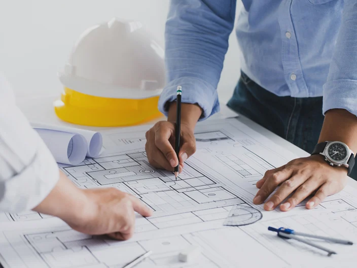engineer meeting for an architectural project. working with partner and engineering tools 