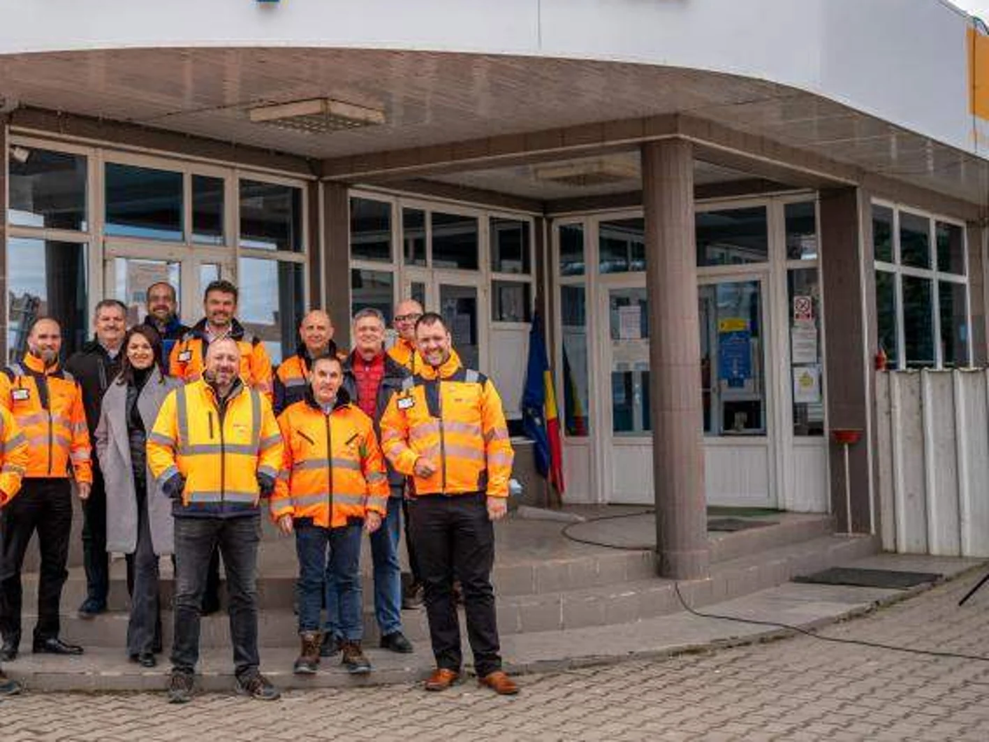 Workers infront of Romania Factory