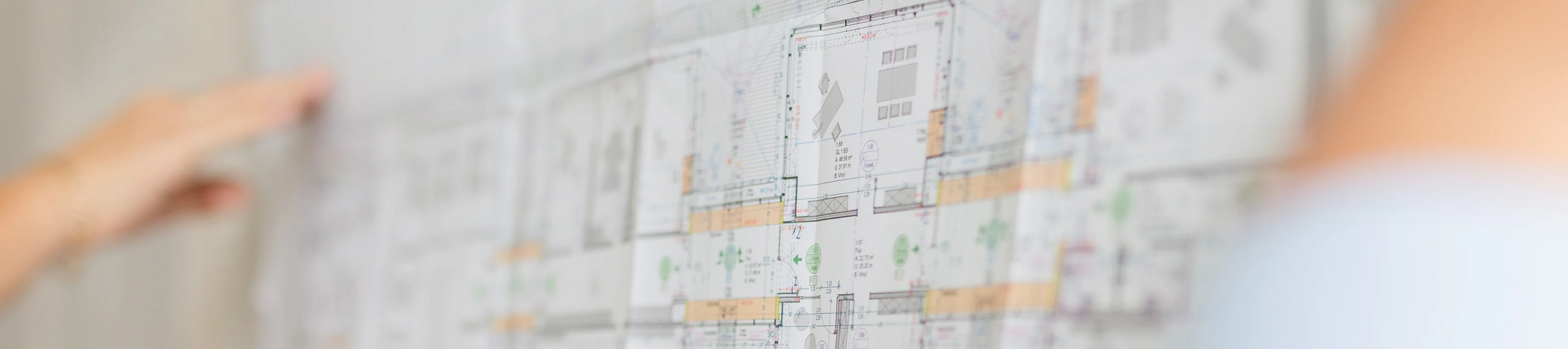 Construction site with plans drawing 