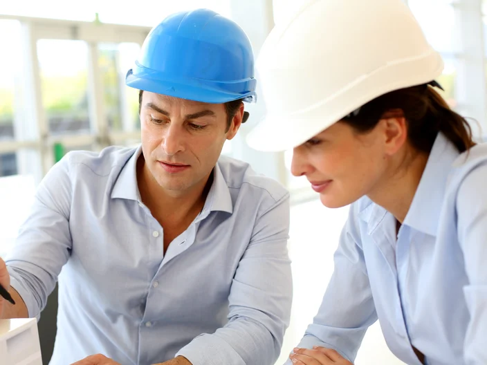Architects working on project in office