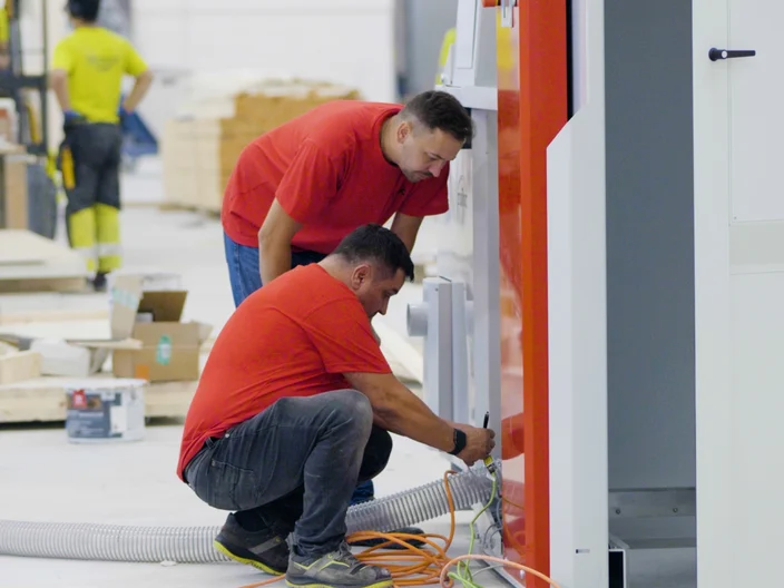 FM Haus workers installing equipment Finland