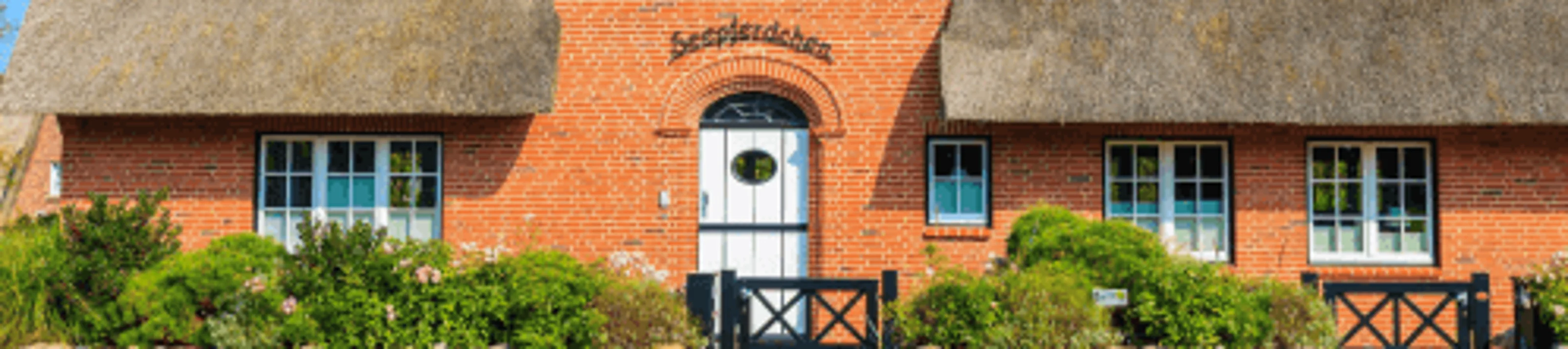 Fassade Klinker Reetdach