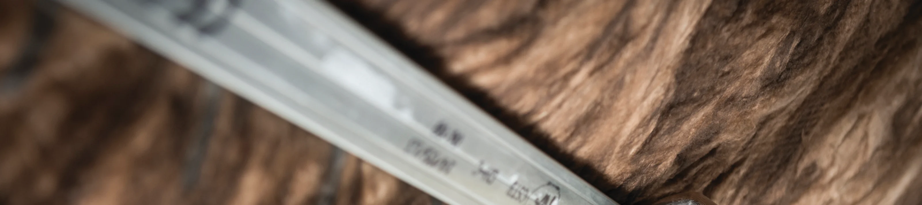 Measuring insulation to be cut