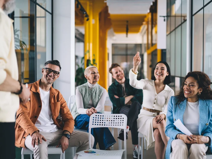 Smiling colleagues having fun together in workplace at office