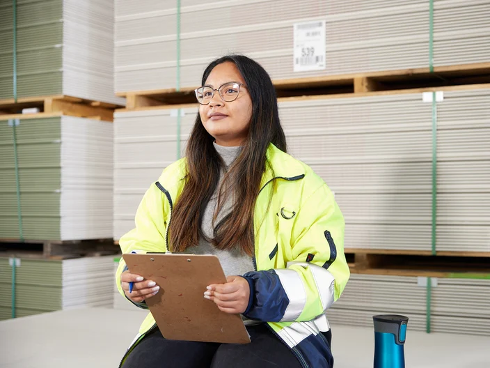 UK-GYP-Female employee in factory